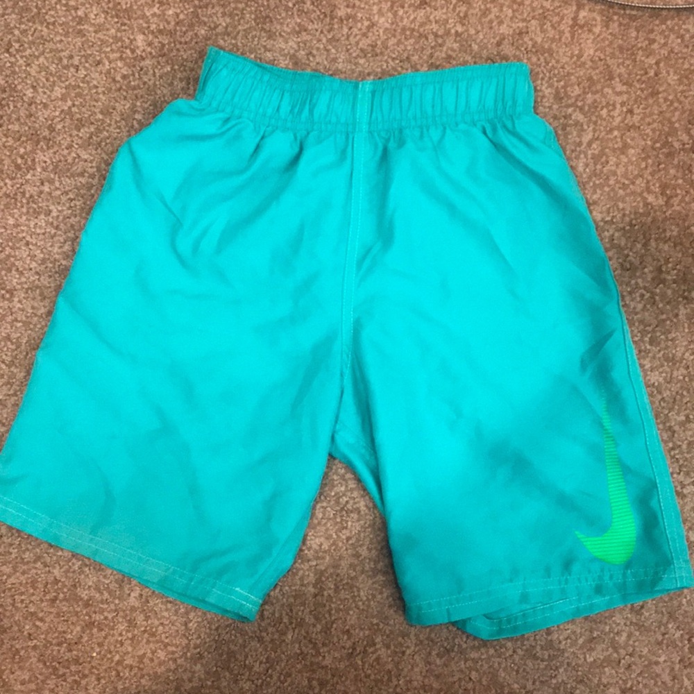 Boys Nike swimsuit size small.